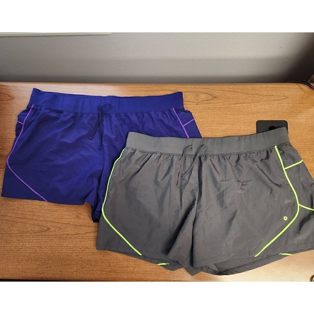 Xersion SET OF 2 XL semi fit shorts. One grey and one purple